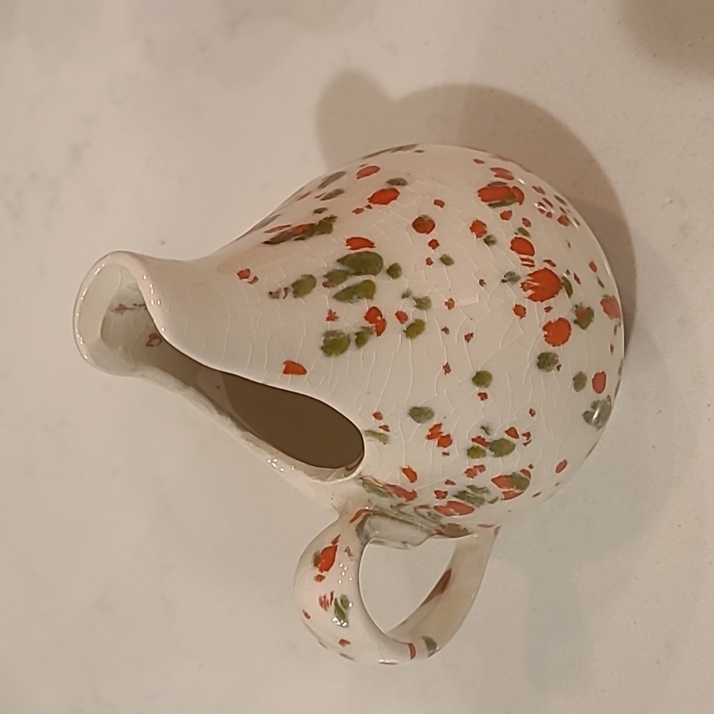 Unique White pottery pitcher